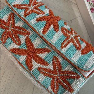 Primark Beaded Clutch with Orange Starfish and Blue Accents NWT Never Carried.
